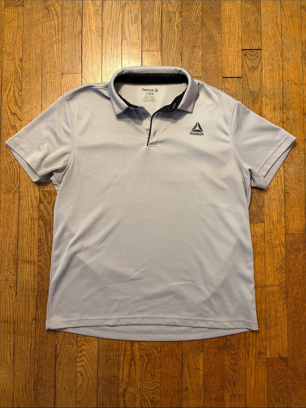 Reebok Men’s Light Gray Polo with Black Trim